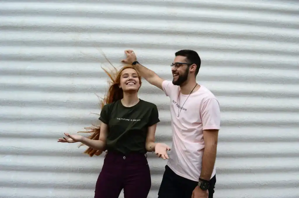 Man and woman smiling about getting anxiety treatment