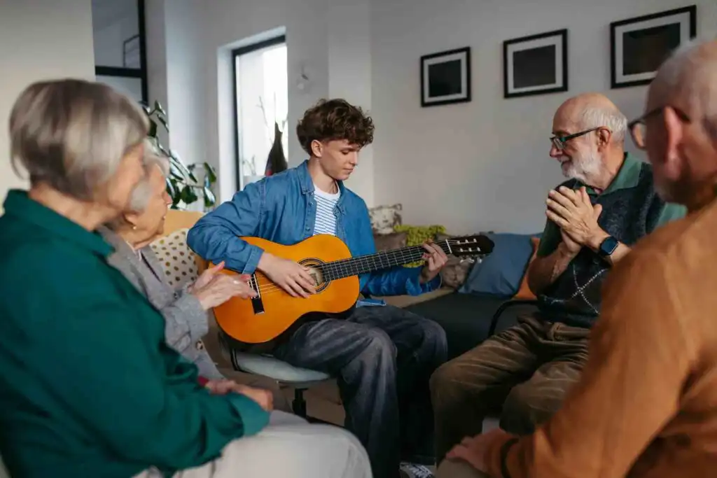 Group participating in music therapy session during addiction recovery